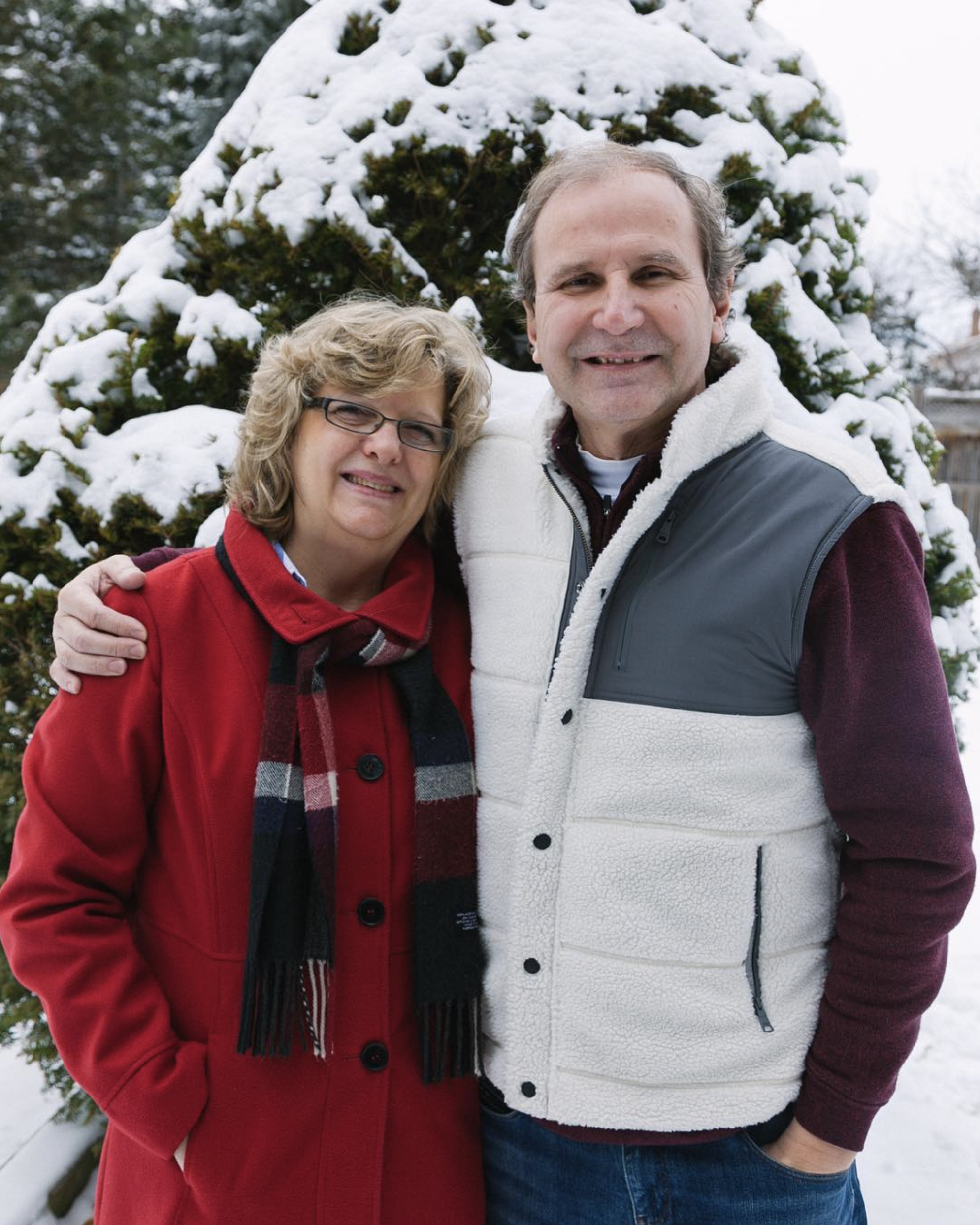 dan and gwen in front of snowy tree